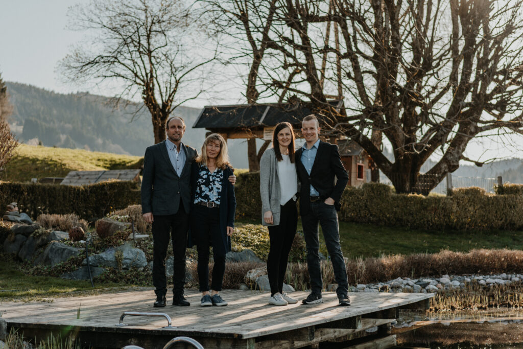 The Presslauer host family on the jetty at the natural swimming pond